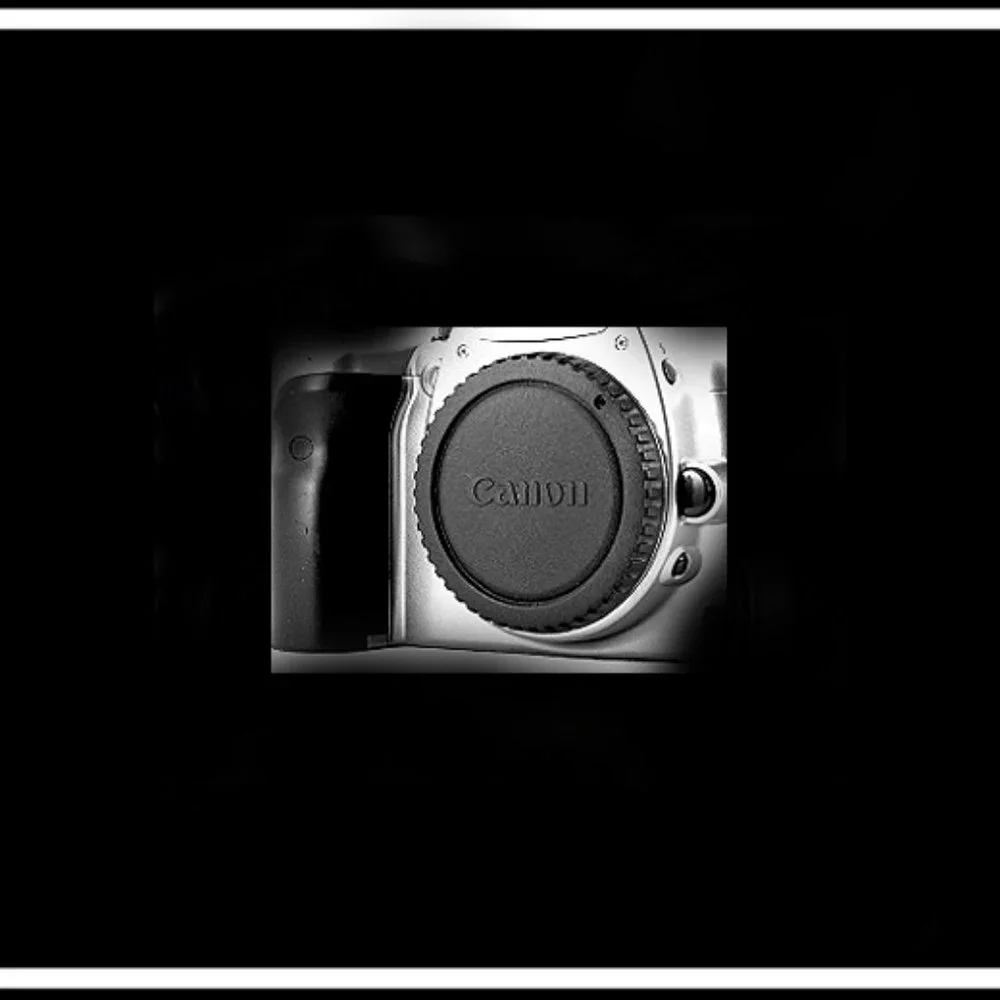 Canon Rebel EOS T2 Photography Camera With An Original Canon Camera Strap